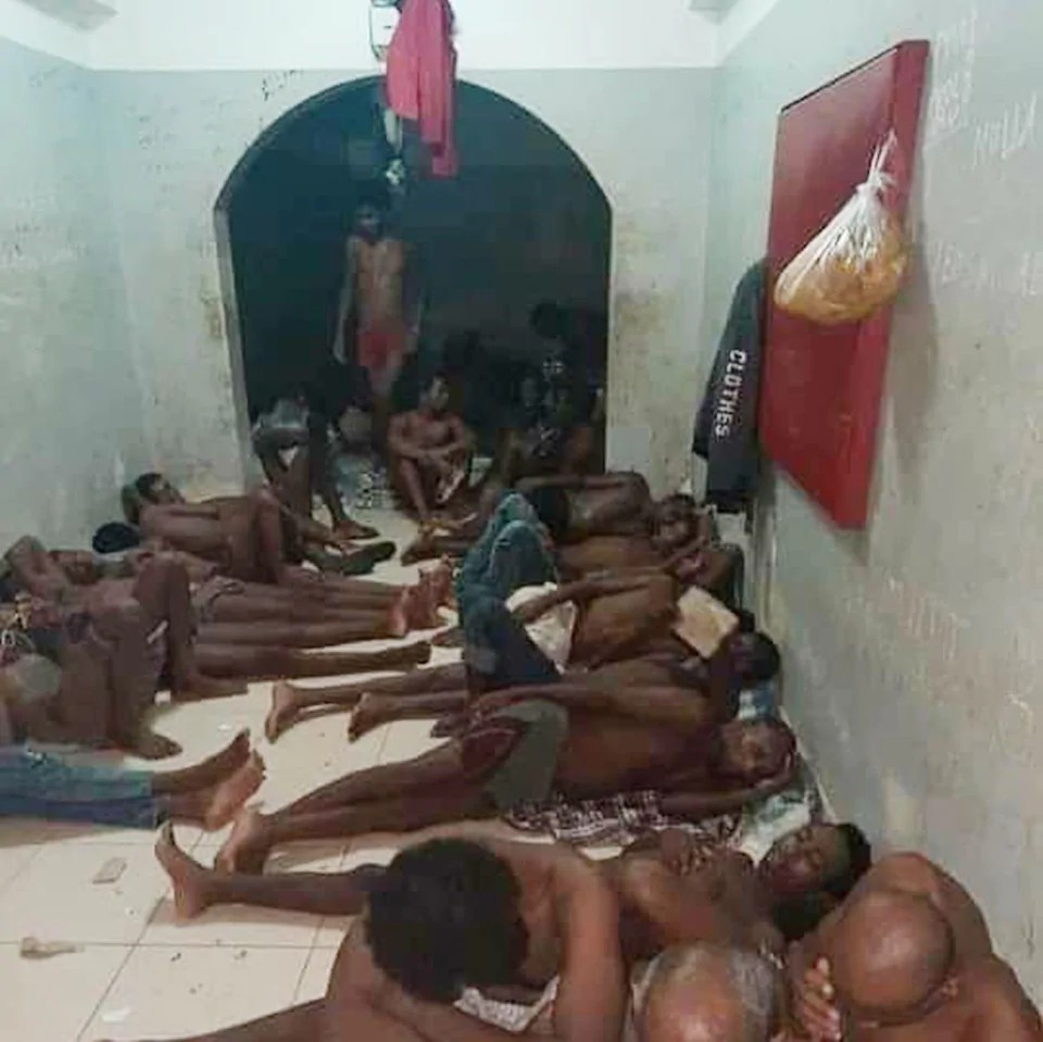 Dozens of emaciated men crippled by the Arabian heat inside one of Saudi Arabia's detention centres Credit: Telegraph exclusive 